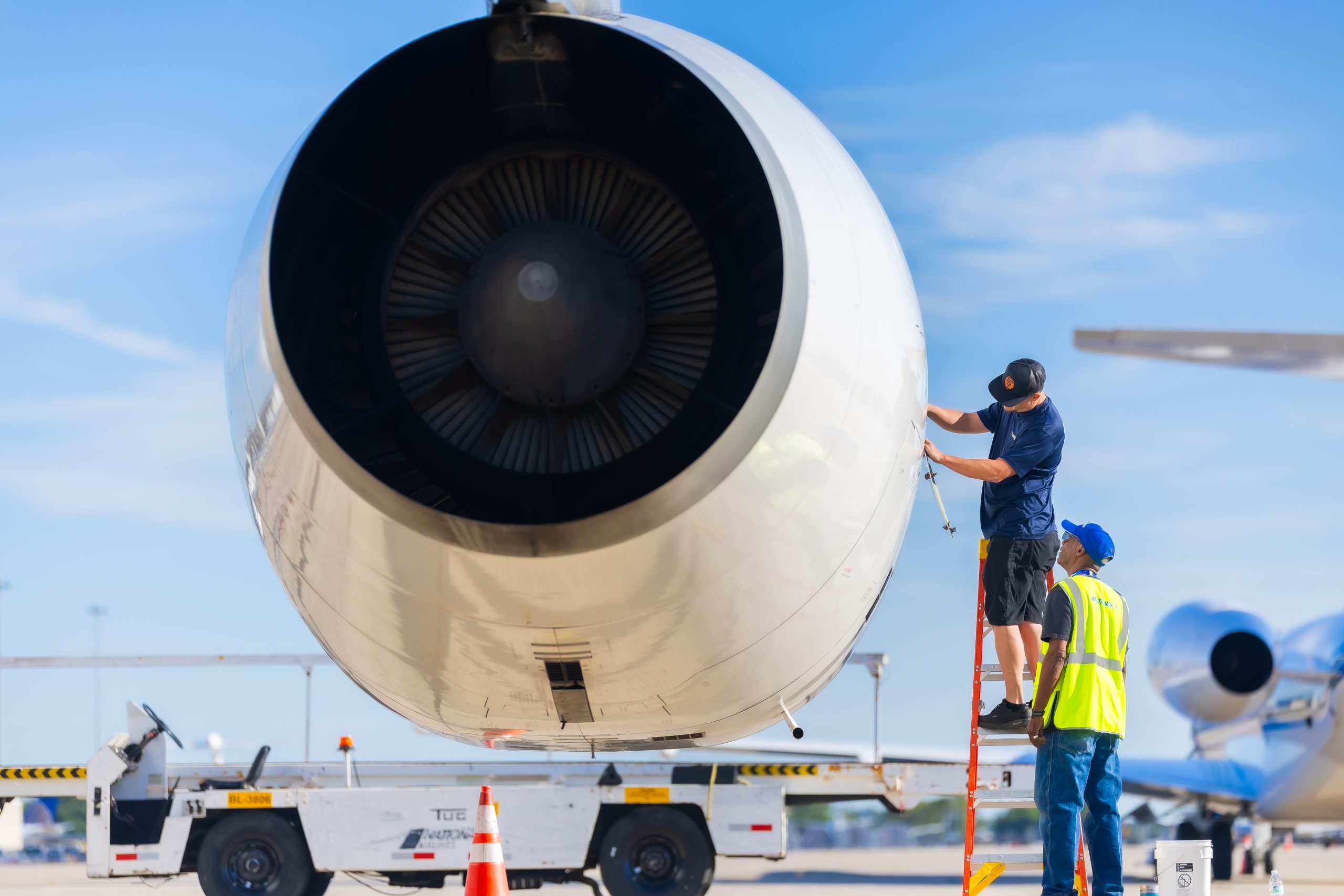 People working on an airplane