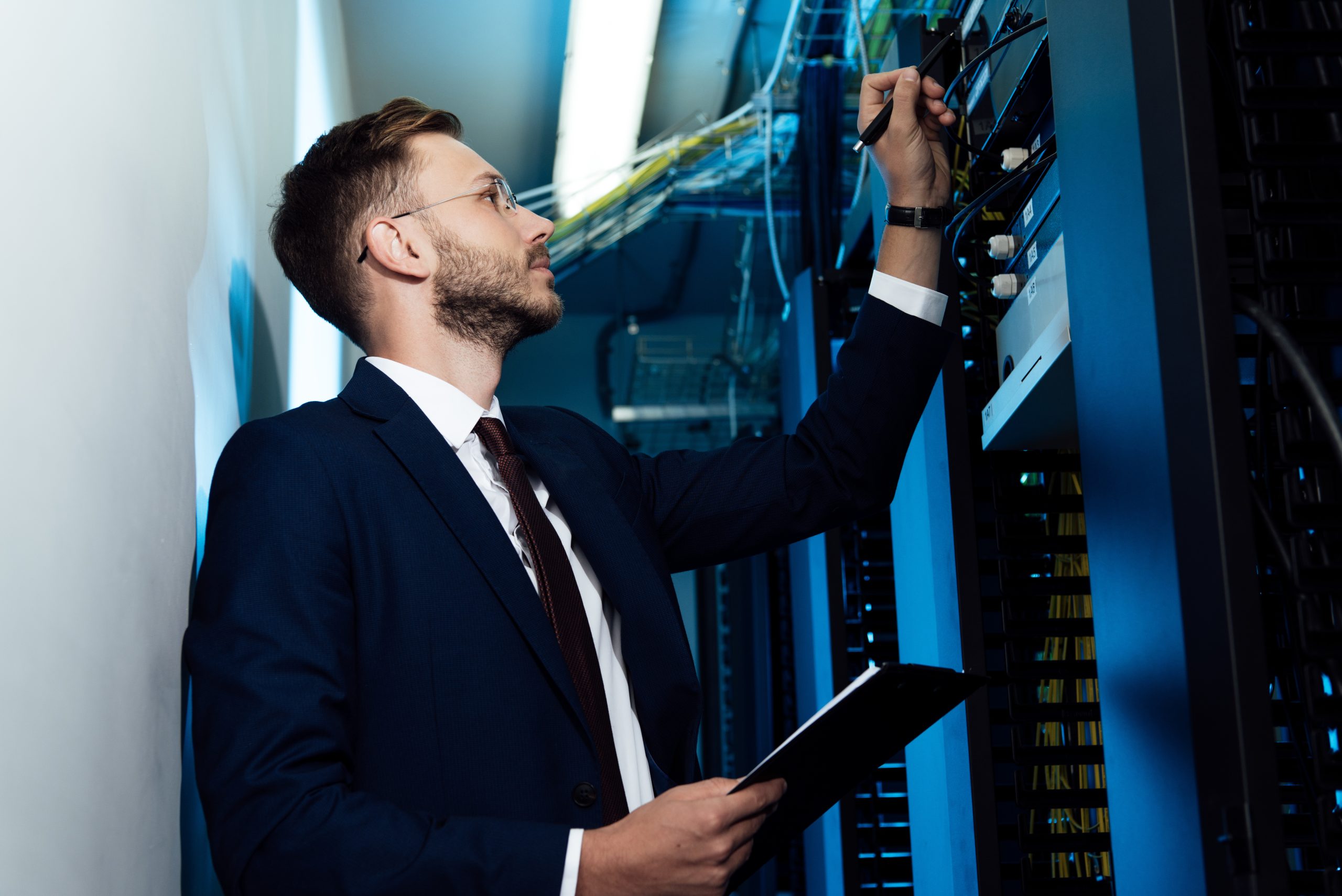 A person inspecting hardware