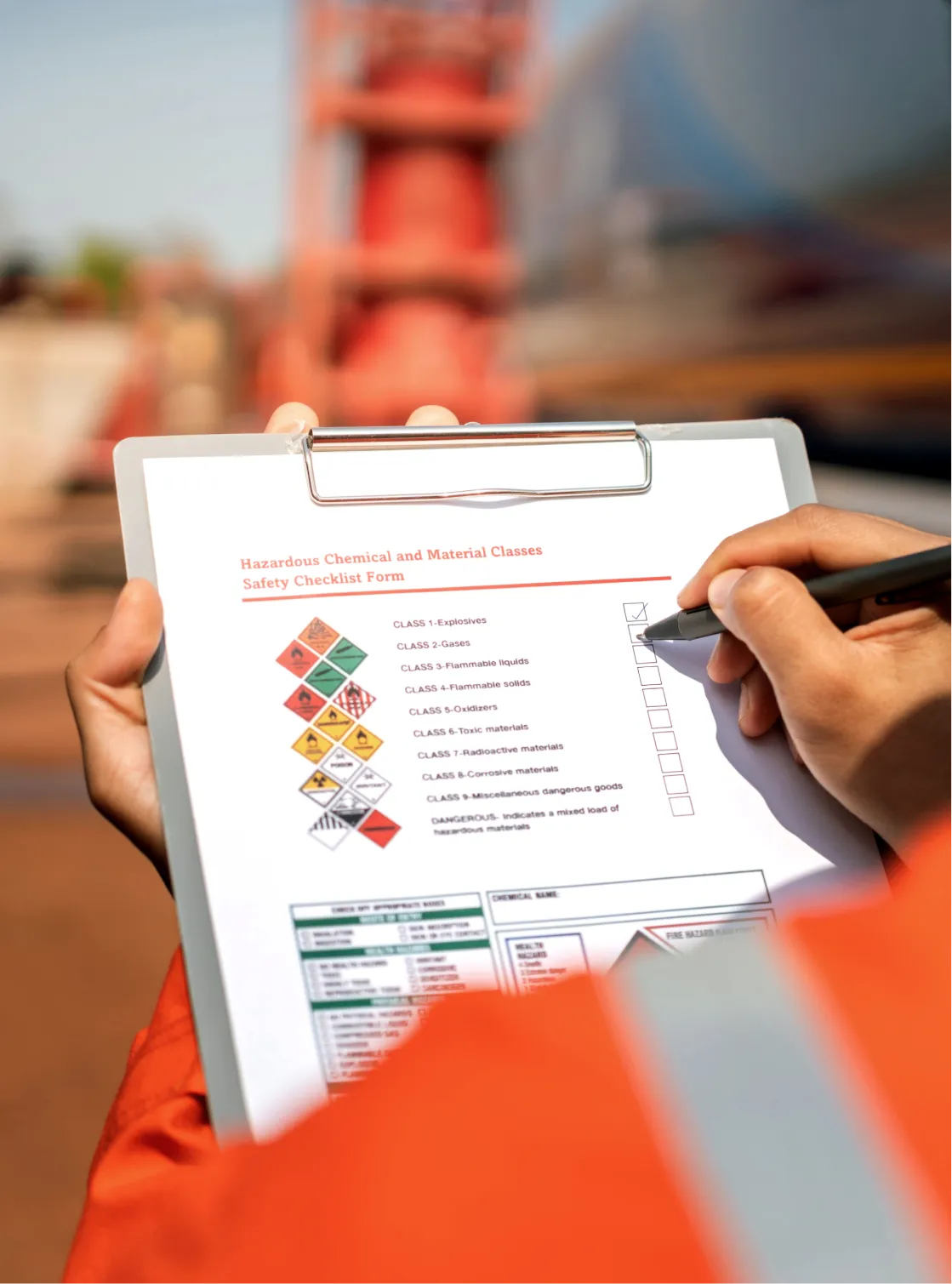 A worker noting documentation